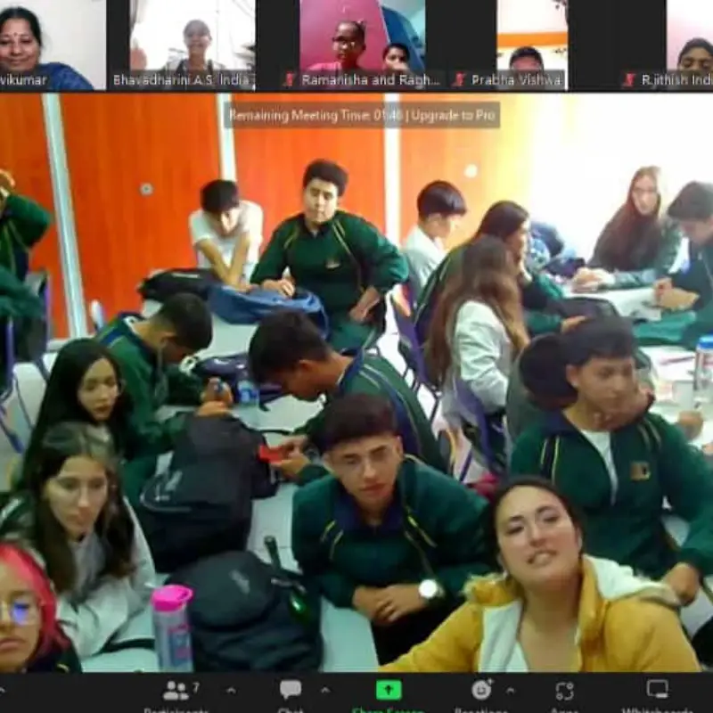 Teacher guiding students through virtual cultural exchange