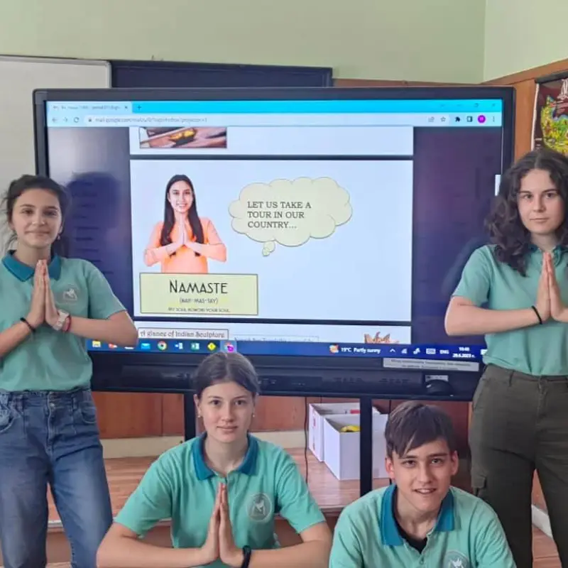 Teacher facilitating virtual exchange with international classroom