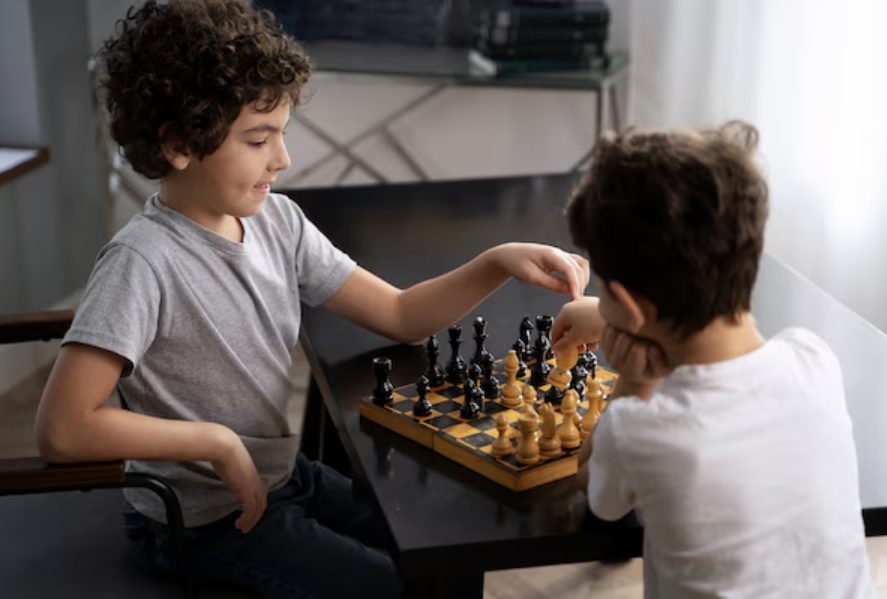 Chess for Friendship — students playing chess together to celebrate World Chess Day.