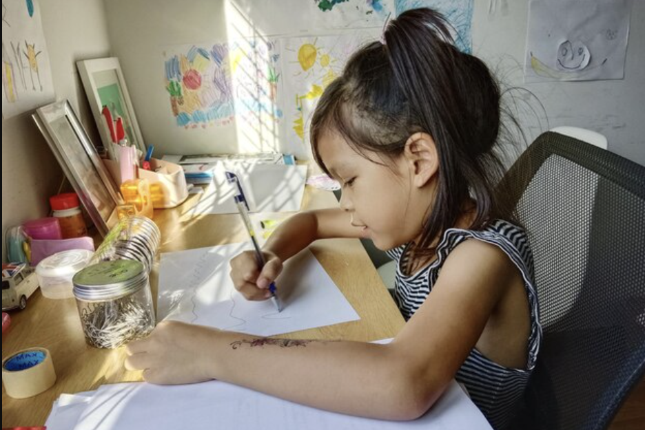 Ozone Chronicles — young students collaborating on an illustrated storybook about ozone layer preservation for world ozone day