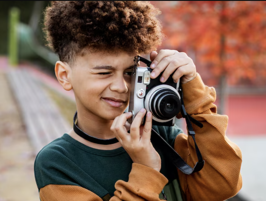 Youth Lens: A World Through Our Eyes — students photographing their school environment for International Youth Day
